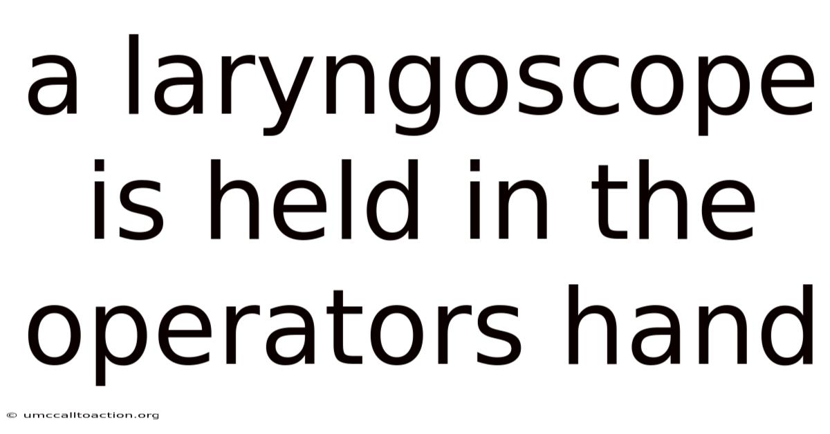 A Laryngoscope Is Held In The Operators Hand